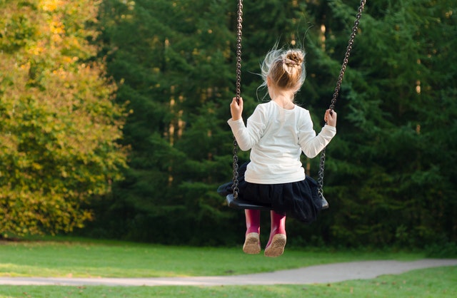 kid on a swing